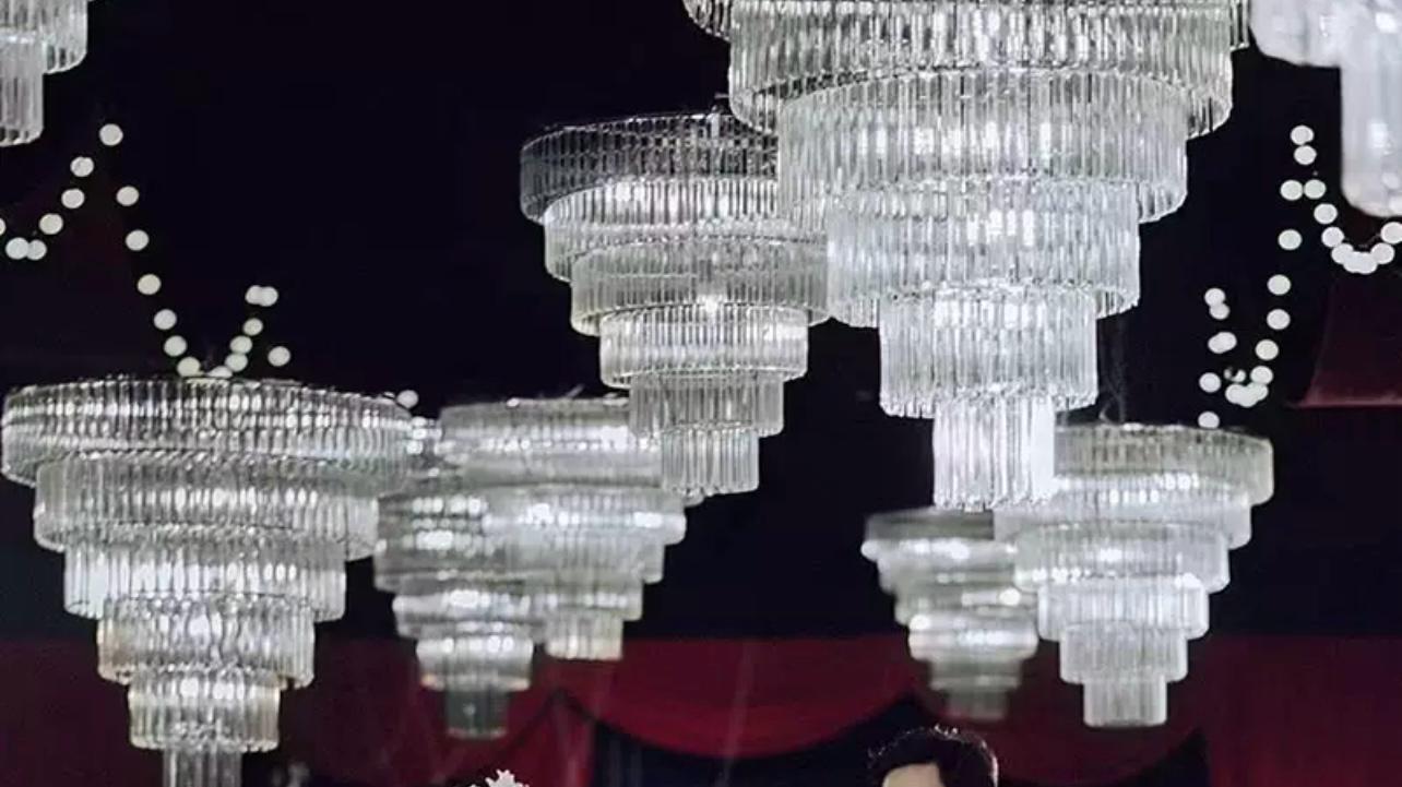 Elegant Alexa Chandelier Hanging at a Wedding Reception
