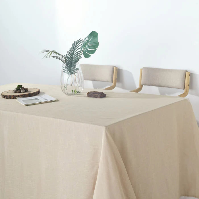 Elegant Event Setup with 90'' x 156'' Beige Woven Rectangular Tablecloth