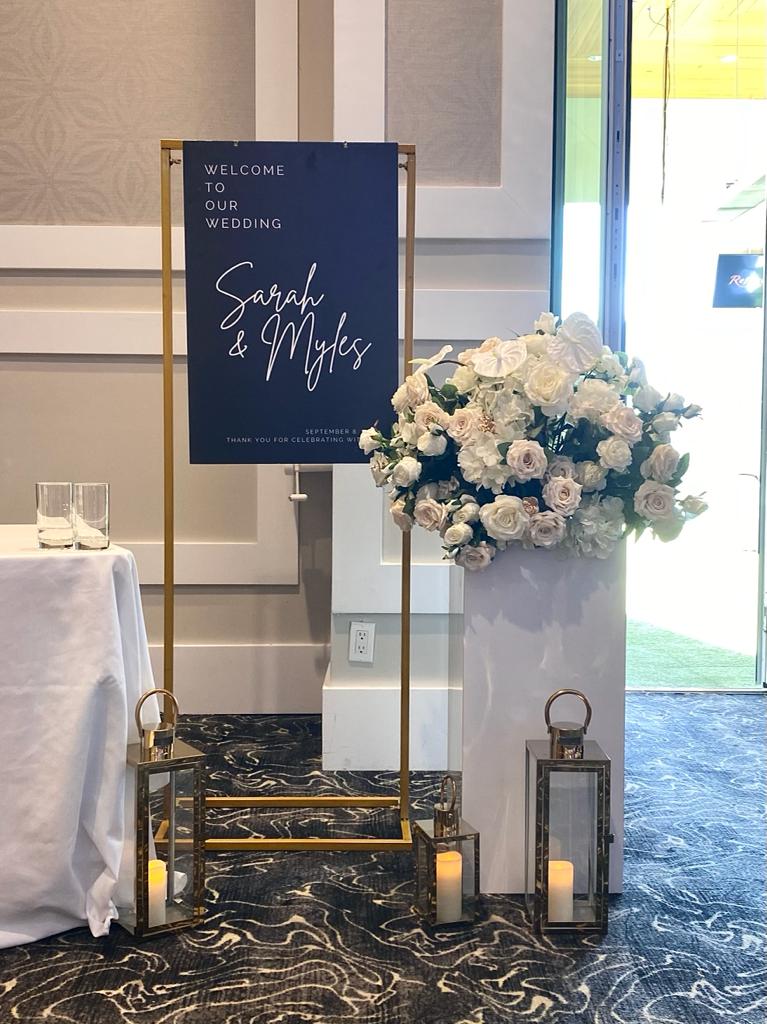 Glossy white podiums of varying heights for event decoration.