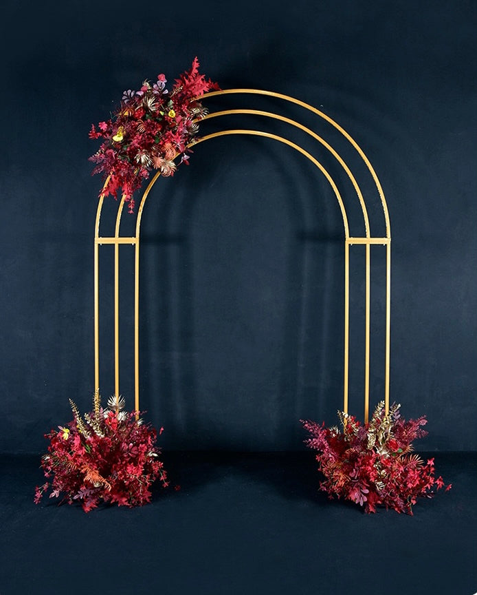 Gold metal 3 layer round top arch decorated with floral arrangements, perfect for elegant event decor