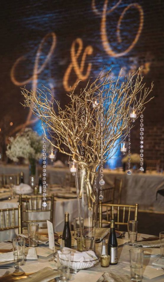 Crystal Draped Wishing Tree with gold manzanita branch at an elegant wedding.