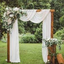 Beautifully Draped Arch with Flowers and Greenery