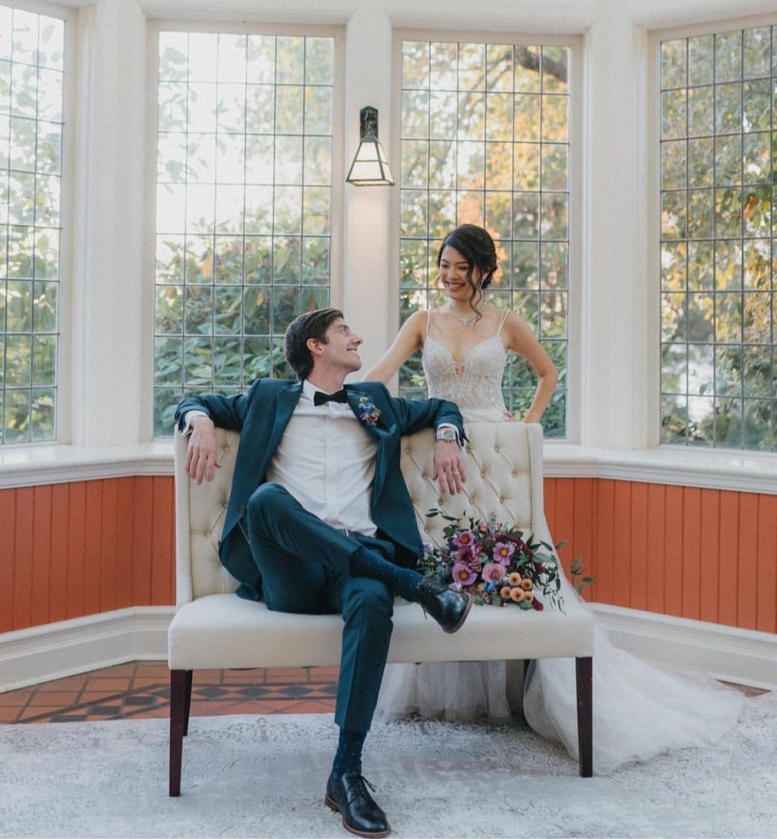 Elegant Cream Truffle Love Seat at an indoor event setting